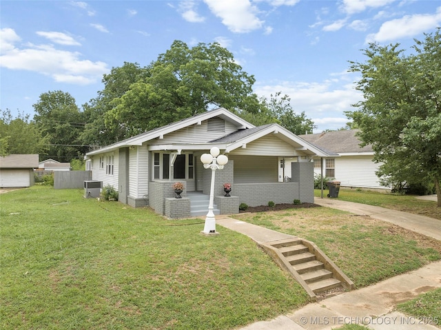 328 I St SW, Ardmore, OK 73401 - bungalow-style home with covered porch and brick siding