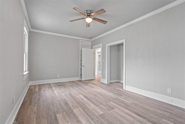 328 I St SW, Ardmore, OK 73401 - empty room with ceiling fan, light wood finished floors, and crown molding