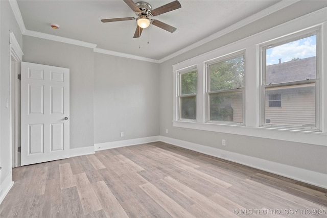 328 I St SW, Ardmore, OK 73401 - empty room featuring light wood-style floors, crown molding, a smoke detector, and a ceiling fan