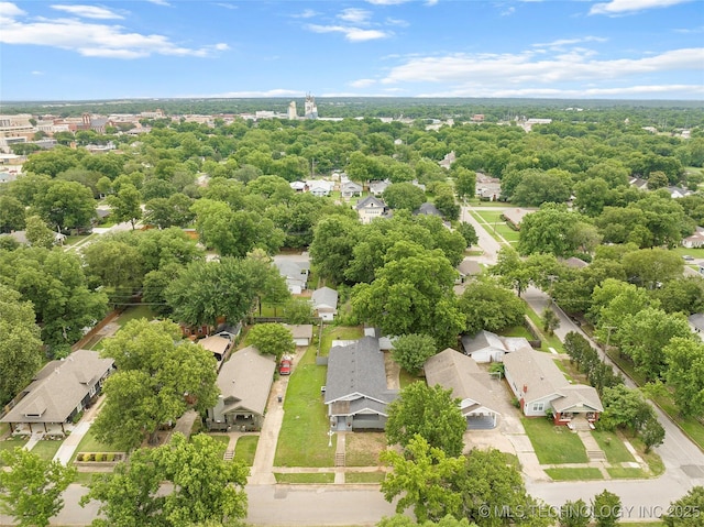 328 I St SW, Ardmore, OK 73401 - aerial perspective of suburban area with a tree filled landscape