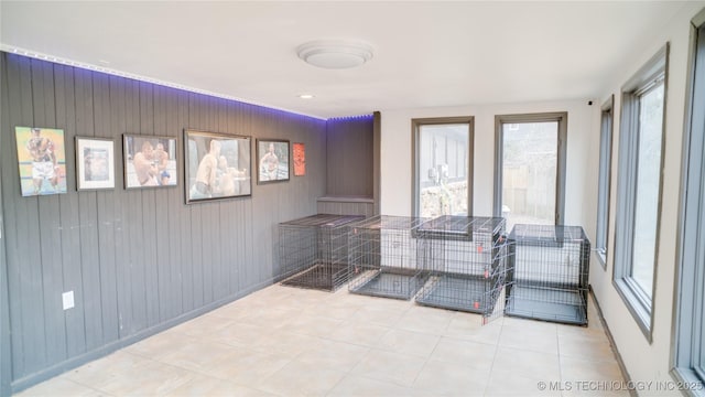 8722 E 74th Pl, Tulsa, OK 74133 - sunroom / solarium featuring wooden walls