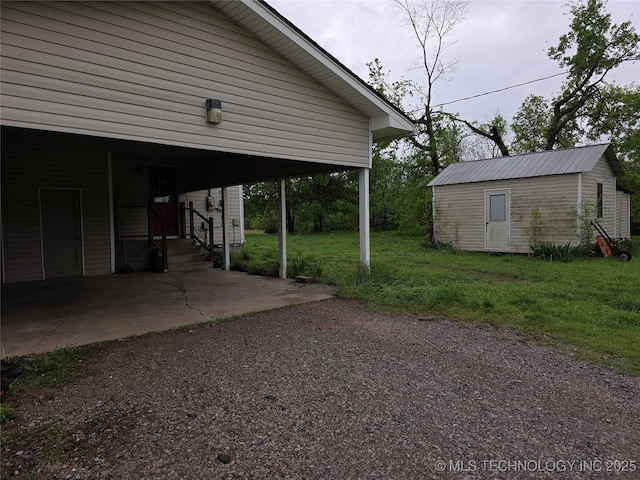 14202 E 492nd Rd, Claremore, OK 74019 - view of parking / parking lot with a carport
