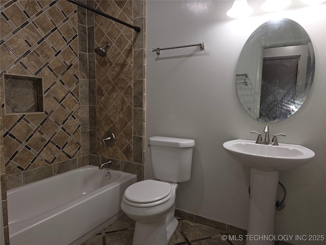 14202 E 492nd Rd, Claremore, OK 74019 - bathroom with baseboards and shower / tub combination