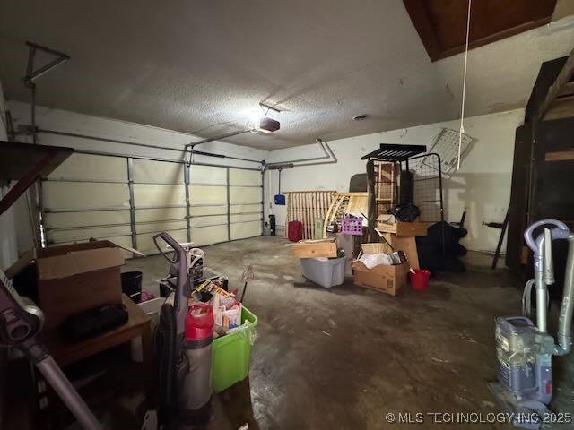 1822 N Xenophon Ave, Tulsa, OK 74127 - garage featuring a garage door opener