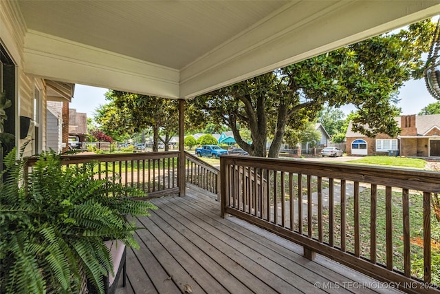 149 N Columbia Pl, Tulsa, OK 74110 - wooden terrace featuring a residential view