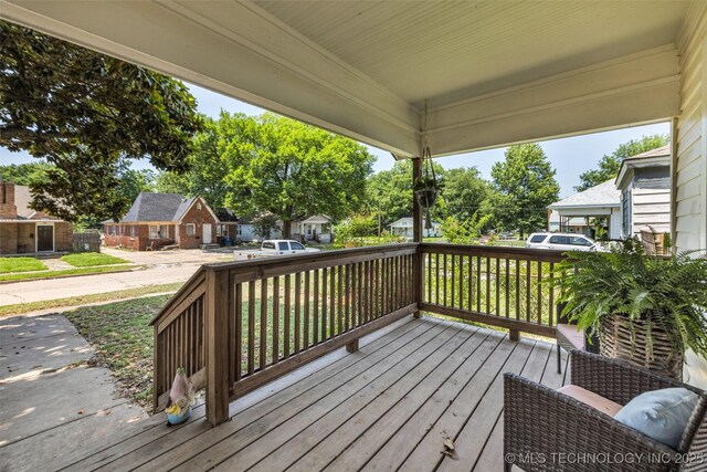 149 N Columbia Pl, Tulsa, OK 74110 - wooden terrace featuring a residential view