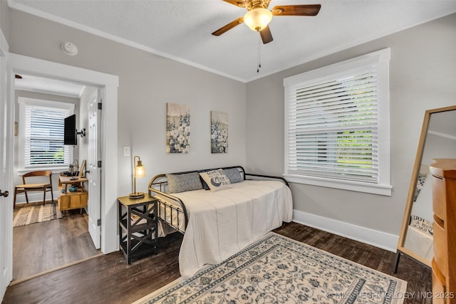 149 N Columbia Pl, Tulsa, OK 74110 - bedroom featuring wood finished floors, crown molding, and ceiling fan