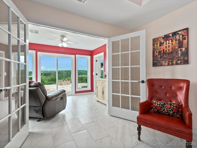 3730 E Mountain Rd, Bartlesville, OK 74003 - living area featuring french doors, light marble finish flooring, and a ceiling fan