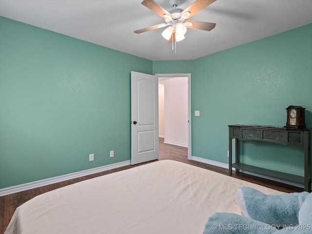 3730 E Mountain Rd, Bartlesville, OK 74003 - bedroom with wood finished floors and ceiling fan