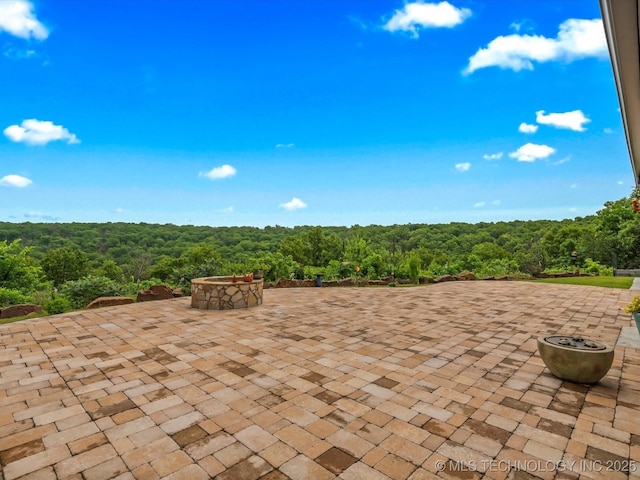 3730 E Mountain Rd, Bartlesville, OK 74003 - view of patio / terrace featuring a view of trees