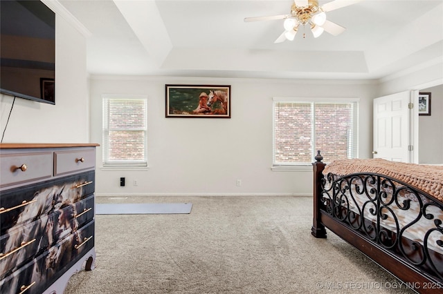 812 N Butternut Ave, Broken Arrow, OK 74012 - carpeted bedroom featuring a raised ceiling, crown molding, and ceiling fan