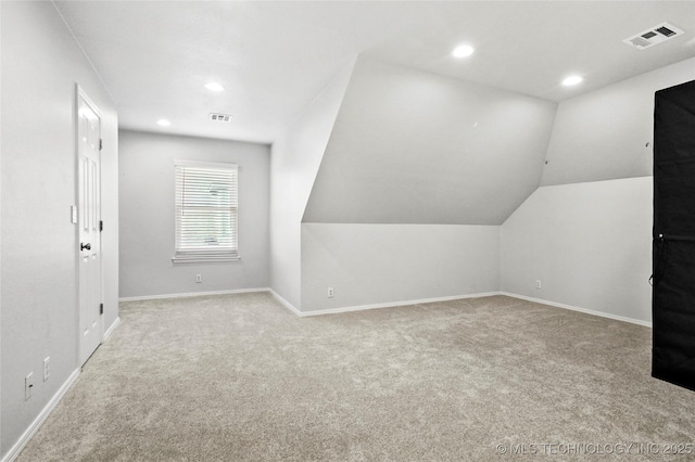 812 N Butternut Ave, Broken Arrow, OK 74012 - additional living space with carpet flooring, recessed lighting, and vaulted ceiling