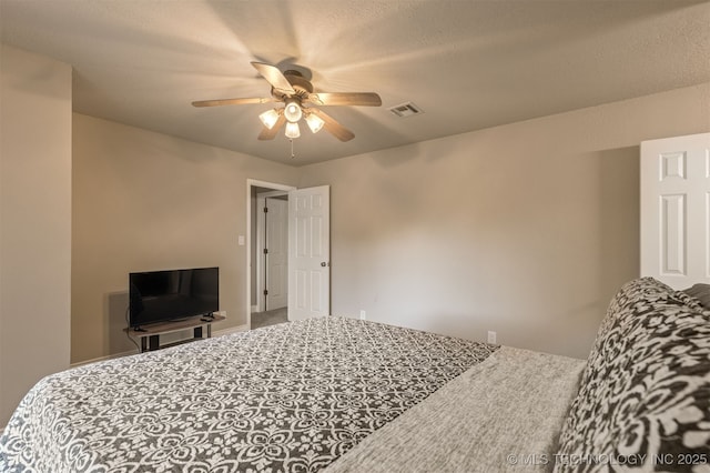 6376 S 80th E Ave Unit 41H, Tulsa, OK 74133 - carpeted bedroom with a ceiling fan