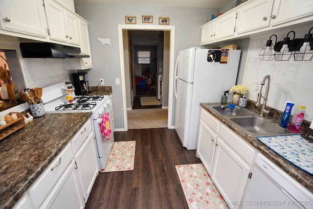 18185 Hilltop Cir, Tahlequah, OK 74464 - kitchen with under cabinet range hood, white appliances, dark wood-type flooring, and tasteful backsplash