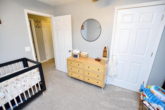 18185 Hilltop Cir, Tahlequah, OK 74464 - bedroom featuring light carpet and a nursery area