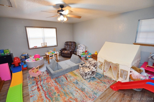 18185 Hilltop Cir, Tahlequah, OK 74464 - playroom featuring wood finished floors and a ceiling fan