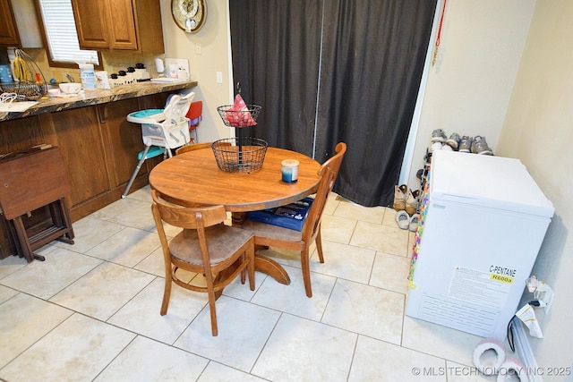 21887 Coffee Hollow Rd, Tahlequah, OK 74464 - dining space featuring light tile patterned floors