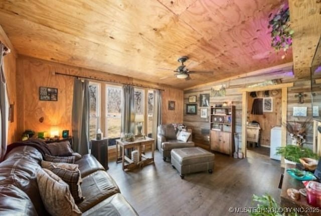 8420 S 145th W Ave, Sapulpa, OK 74066 - living area featuring wooden walls, wood ceiling, ceiling fan, wood finished floors, and vaulted ceiling