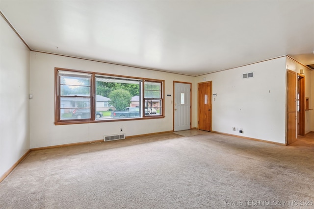 1514 E 54th St, Tulsa, OK 74105 - carpeted spare room featuring baseboards