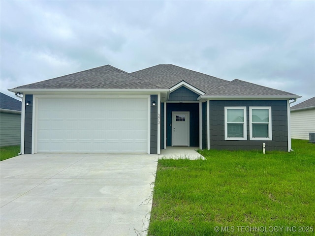 373 Worth Ave, Durant, OK 74701 - single story home featuring concrete driveway, a front yard, an attached garage, and roof with shingles