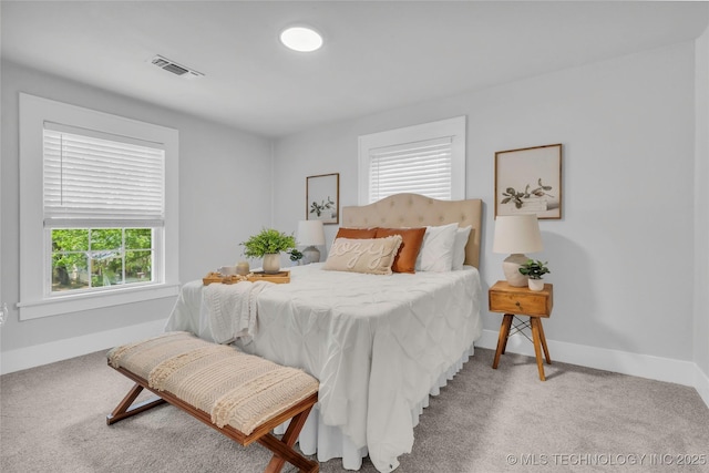 408 K SW, Ardmore, OK 73401 - carpeted bedroom featuring baseboards