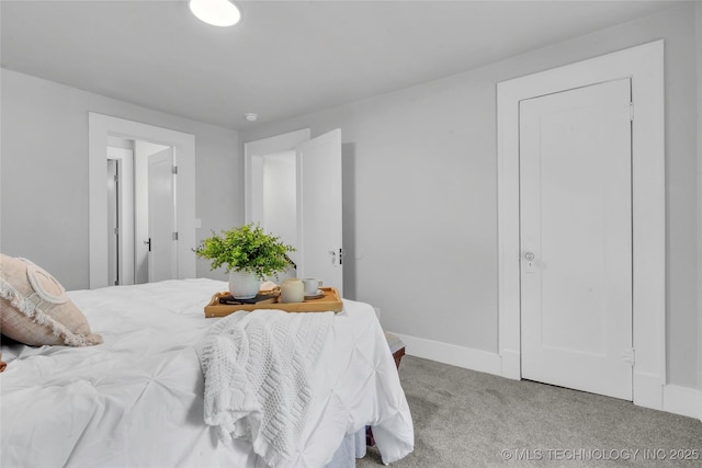 408 K SW, Ardmore, OK 73401 - bedroom featuring carpet floors and baseboards