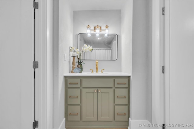 408 K SW, Ardmore, OK 73401 - bathroom featuring vanity and baseboards