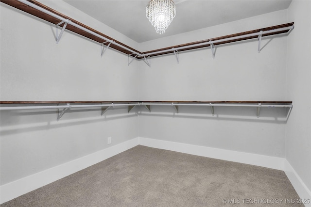408 K SW, Ardmore, OK 73401 - walk in closet featuring carpet flooring and a chandelier