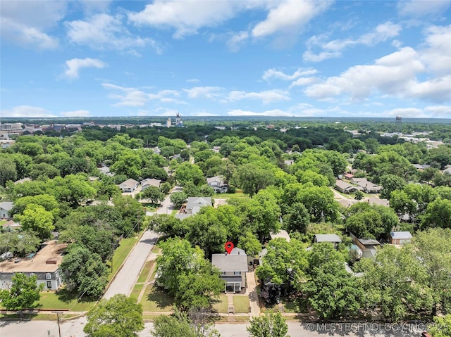 408 K SW, Ardmore, OK 73401 - aerial view of residential area with a tree filled landscape