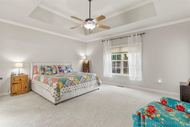 8811 E 110th St S, Bixby, OK 74133 - bedroom with a tray ceiling, carpet, ornamental molding, and ceiling fan