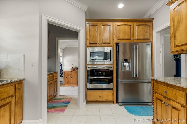 8811 E 110th St S, Bixby, OK 74133 - kitchen featuring appliances with stainless steel finishes, light stone countertops, brown cabinets, ornamental molding, and decorative backsplash