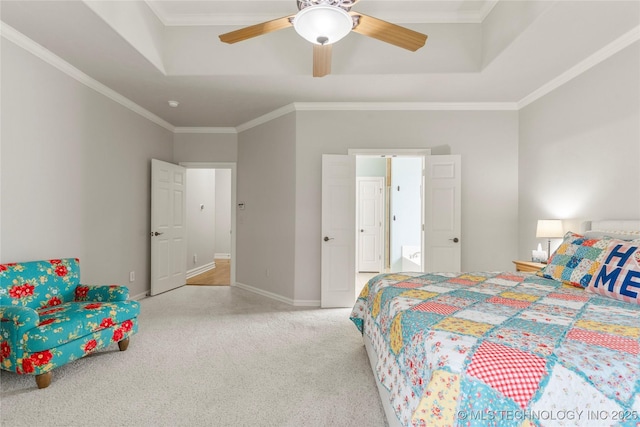 8811 E 110th St S, Bixby, OK 74133 - bedroom with carpet, a raised ceiling, ceiling fan, and ornamental molding