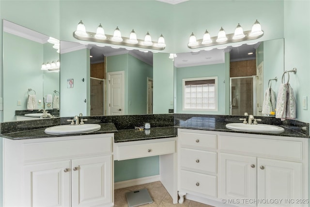 8811 E 110th St S, Bixby, OK 74133 - full bathroom with a shower stall, ornamental molding, two vanities, and tile patterned floors
