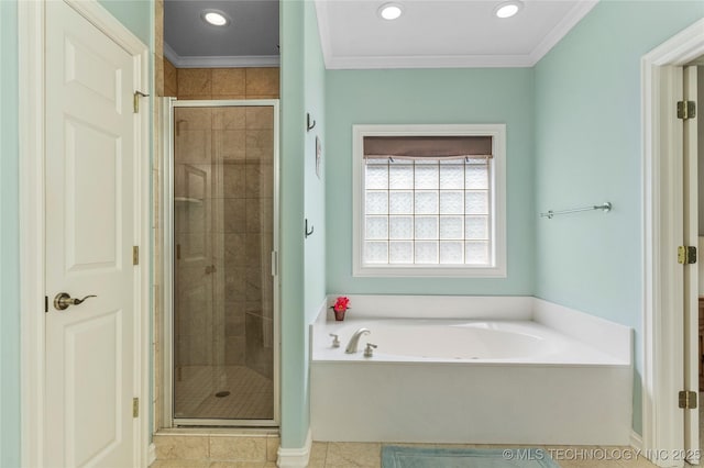 8811 E 110th St S, Bixby, OK 74133 - full bathroom featuring a bath, a shower stall, ornamental molding, recessed lighting, and tile patterned flooring