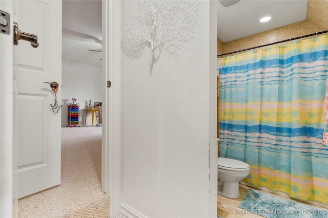 8811 E 110th St S, Bixby, OK 74133 - full bathroom with toilet and a shower with shower curtain