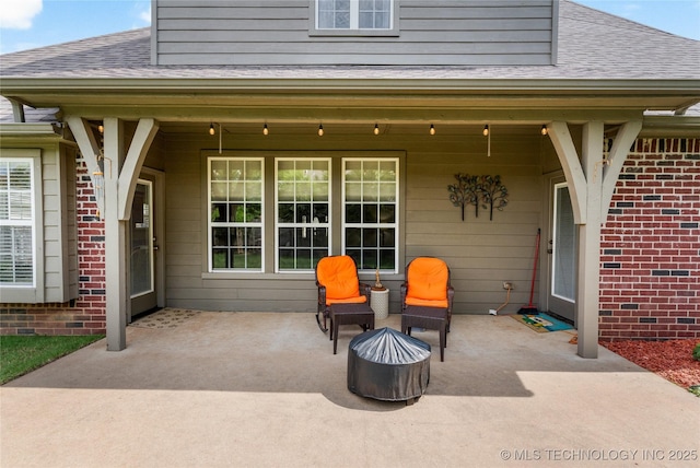 8811 E 110th St S, Bixby, OK 74133 - view of patio / terrace with a fire pit