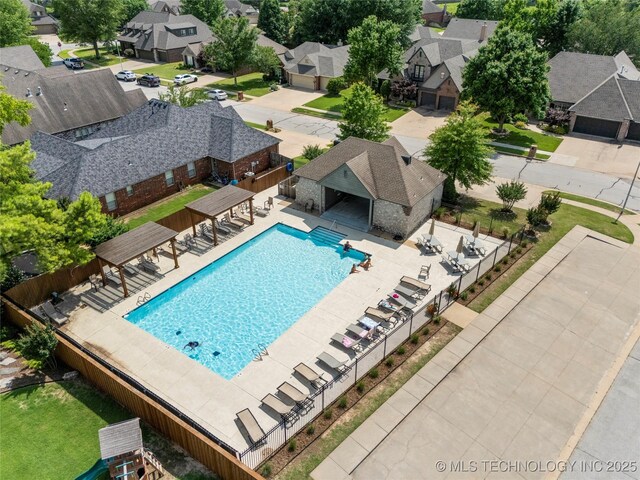 8811 E 110th St S, Bixby, OK 74133 - community pool featuring a residential view and a patio area