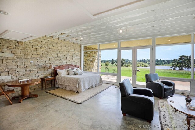 421403 E 1920th Rd, Antlers, OK 74523 - bedroom featuring access to exterior, french doors, and concrete flooring