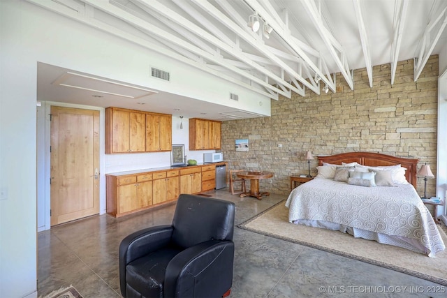 421403 E 1920th Rd, Antlers, OK 74523 - bedroom with concrete floors and fridge