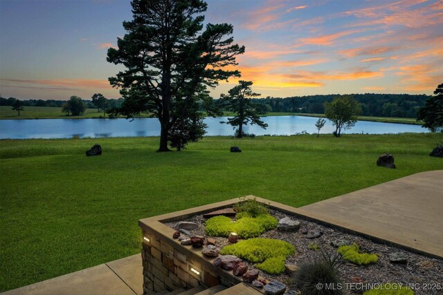 421403 E 1920th Rd, Antlers, OK 74523 - yard at dusk with a water view and a lawn