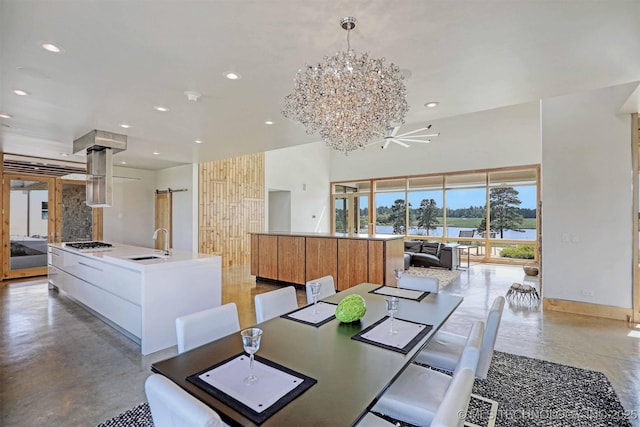 421403 E 1920th Rd, Antlers, OK 74523 - dining area with concrete floors, recessed lighting, a chandelier, and a water view