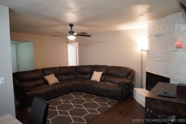 7817 N 122nd E Ave, Owasso, OK 74055 - living area featuring ceiling fan, wood finished floors, and a fireplace
