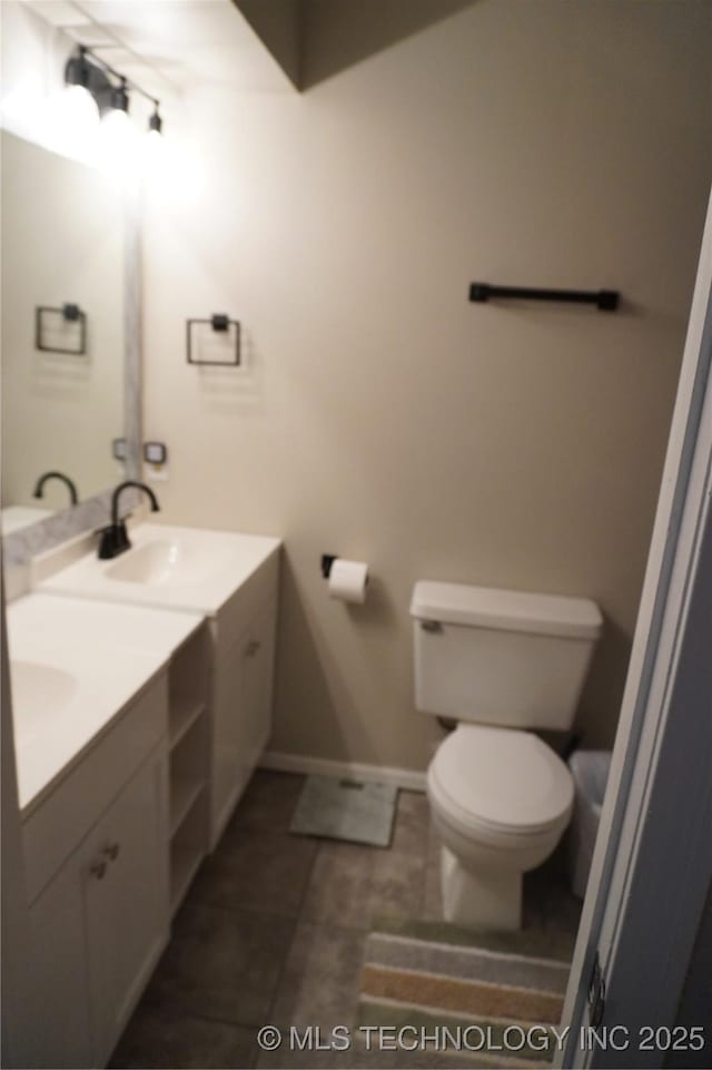 7817 N 122nd E Ave, Owasso, OK 74055 - bathroom with double vanity and tile patterned floors