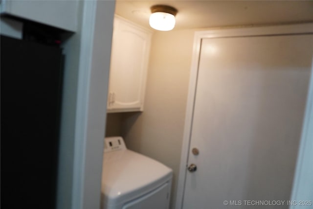 7817 N 122nd E Ave, Owasso, OK 74055 - washroom featuring cabinet space and washer / dryer