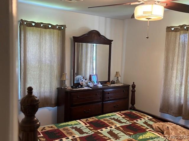 902 NE Rushwood Dr, Stigler, OK 74462 - bedroom with a ceiling fan