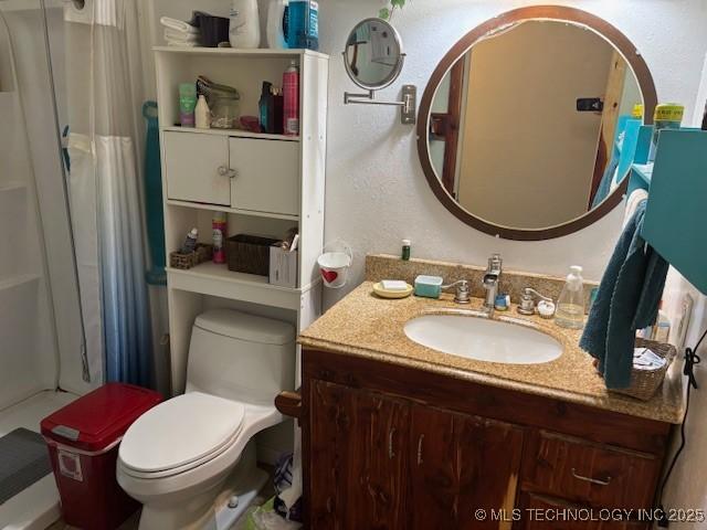 902 NE Rushwood Dr, Stigler, OK 74462 - full bathroom with a shower with curtain and vanity