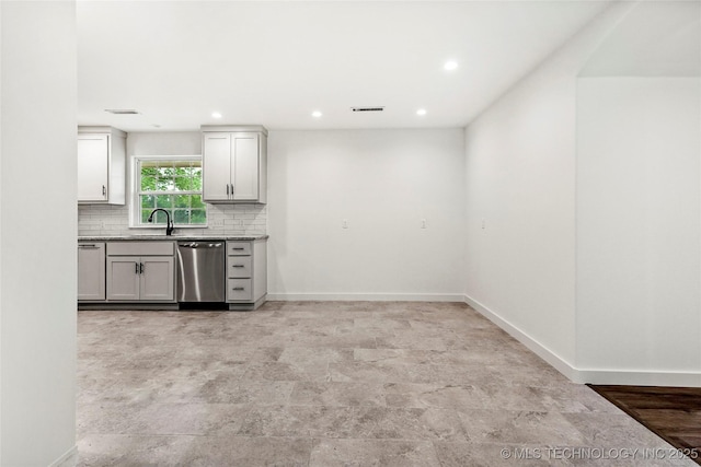 10062 E Northshire St, Claremore, OK 74017 - kitchen featuring stainless steel dishwasher, backsplash, recessed lighting, and light stone finish floors