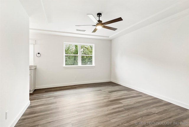 10062 E Northshire St, Claremore, OK 74017 - spare room featuring ceiling fan and wood finished floors