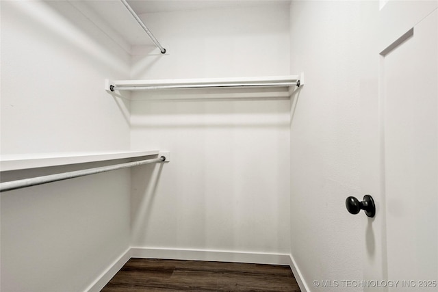 10062 E Northshire St, Claremore, OK 74017 - walk in closet featuring dark wood finished floors