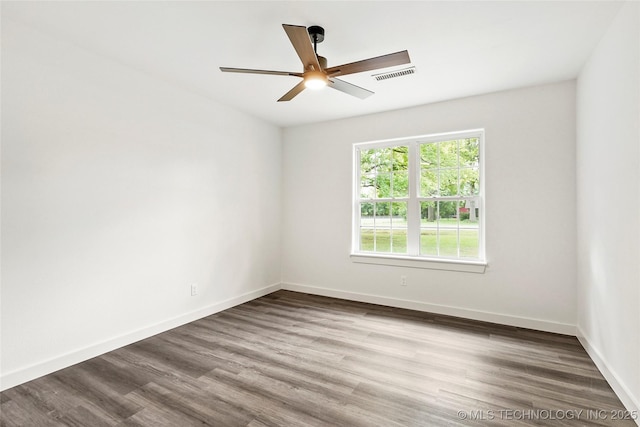 10062 E Northshire St, Claremore, OK 74017 - unfurnished room with wood finished floors and ceiling fan